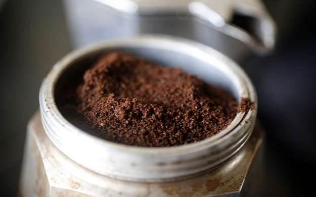 Put the ground coffee into the moka pot’s filtering basket.